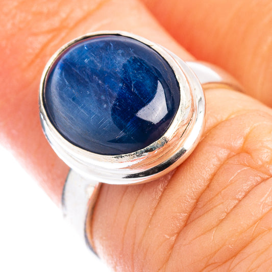 Sterling silver kyanite ring with round blue cabochon stone, bezel set