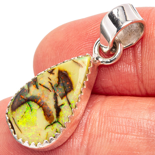 Sterling silver opal pendant with teardrop cabochon and scalloped bezel, on bail
