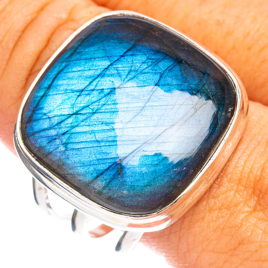 Sterling silver ring with oval blue labradorite cabochon, bezel set