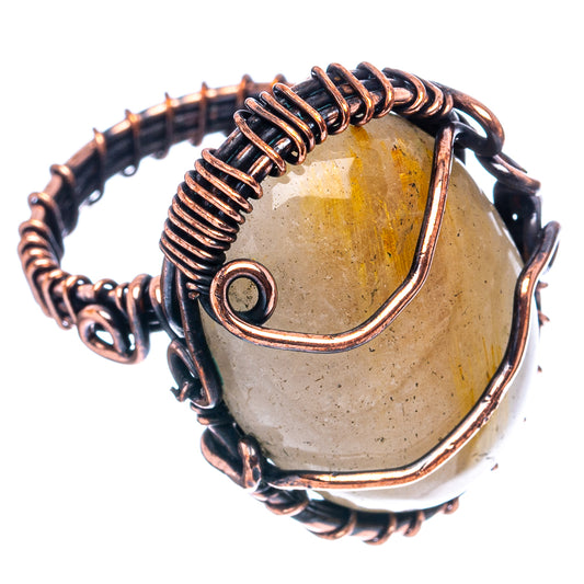 Oxidized copper wire wrap ring with oval rutilated quartz, copper bezel setting