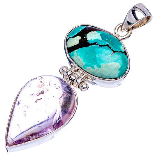 Oval turquoise cabochon pendant with sterling silver bail and teardrop gemstone accent