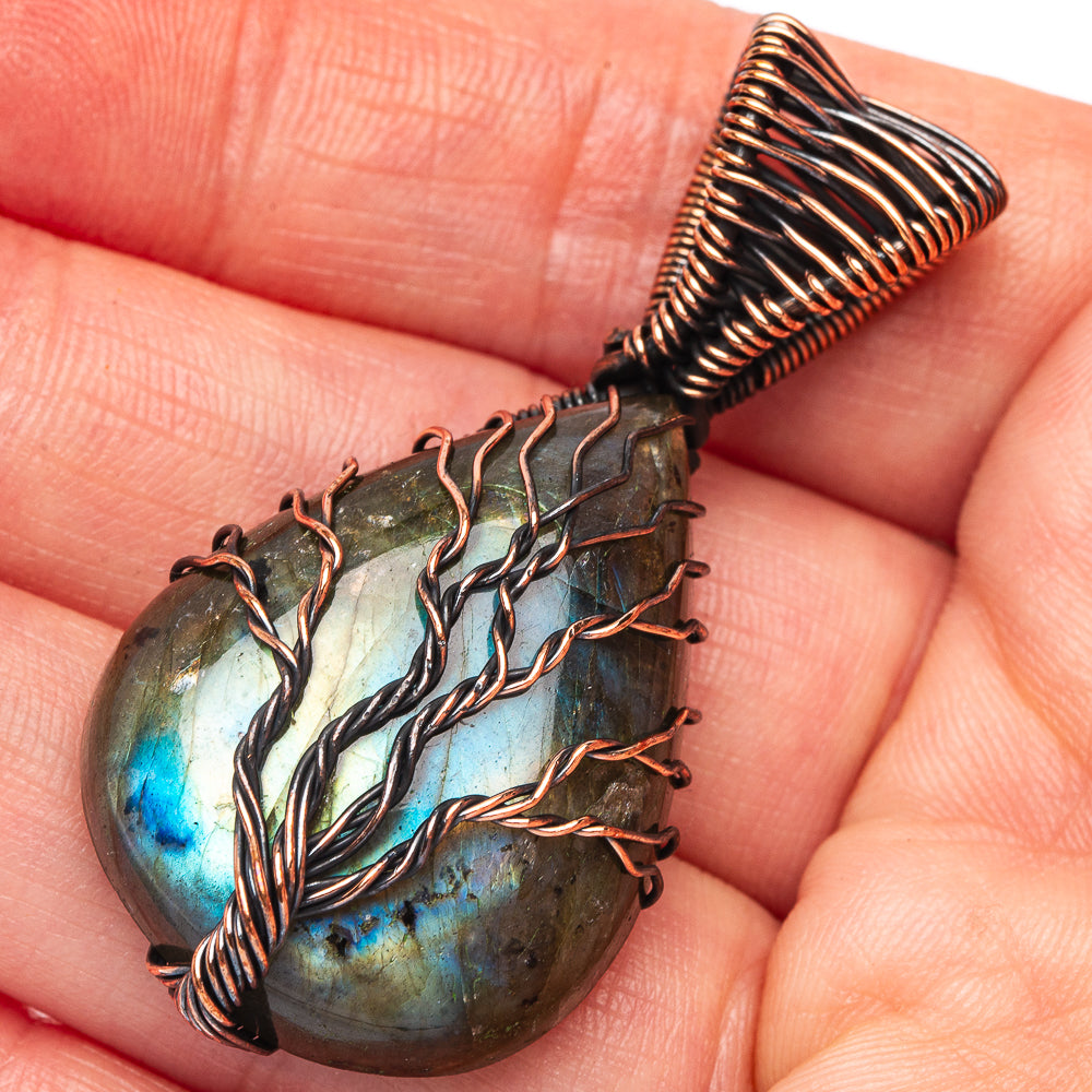 Oxidized copper wire-wrapped labradorite pendant with tree-of-life design teardrop