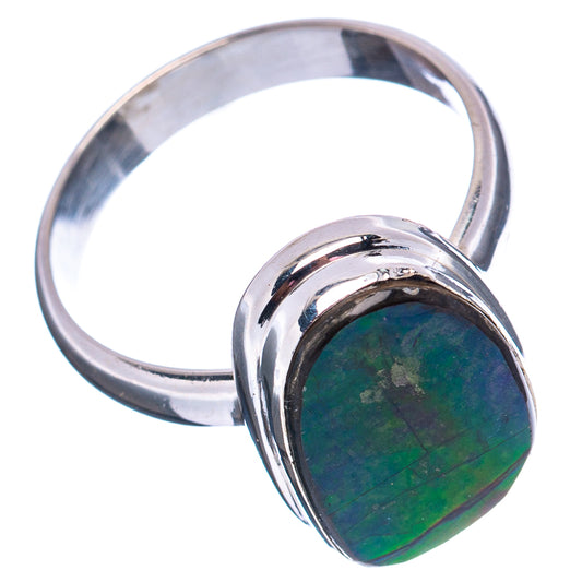 Oval ammolite ring with deep green-blue iridescent stone in polished sterling silver