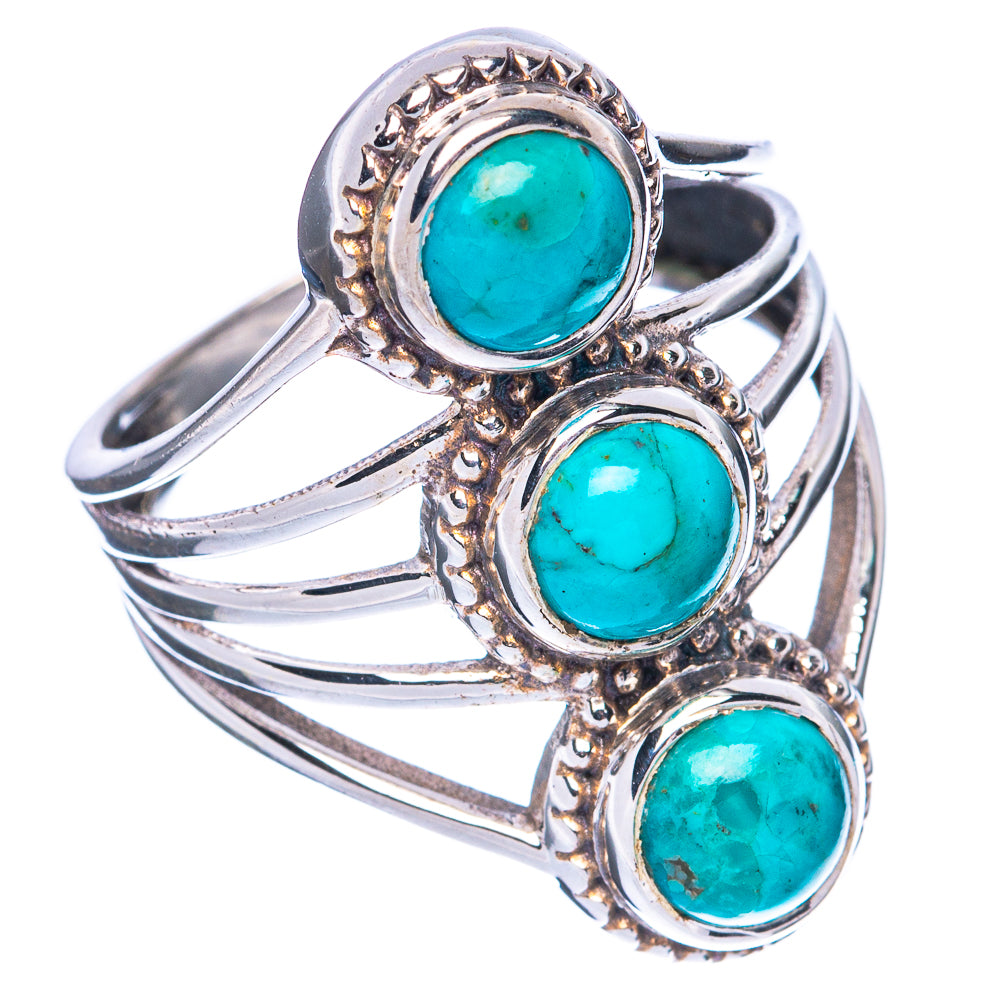 Silver ring with three turquoise cabochon stones and ornate bezel edges