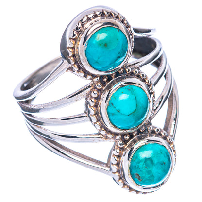 Silver ring with three turquoise cabochon stones and ornate bezel edges