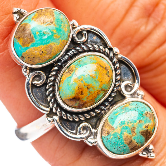 Turquoise oval cabochon adjustable sterling silver ring with three gemstone settings