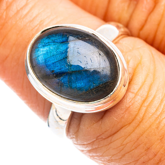 Labradorite oval gemstone set in .925 sterling silver ring, dark blue-gray with silver band