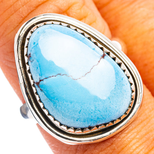 Turquoise oval cabochon adjustable sterling silver ring, blue stone with wire border