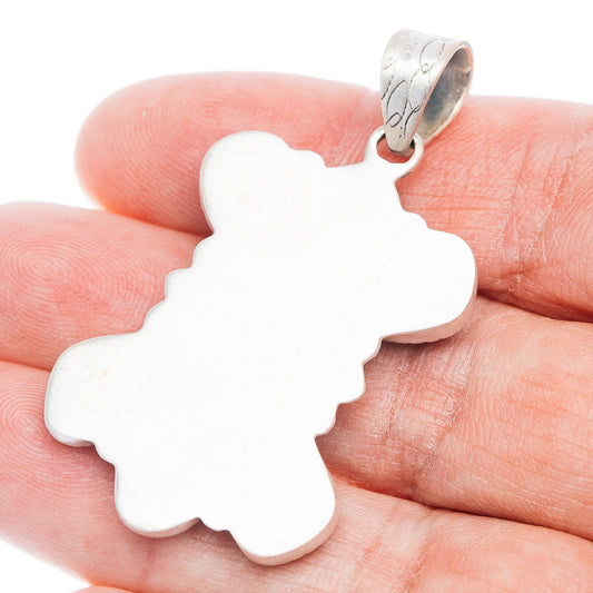 Sterling silver pendant bail with blank silhouette charm in hand