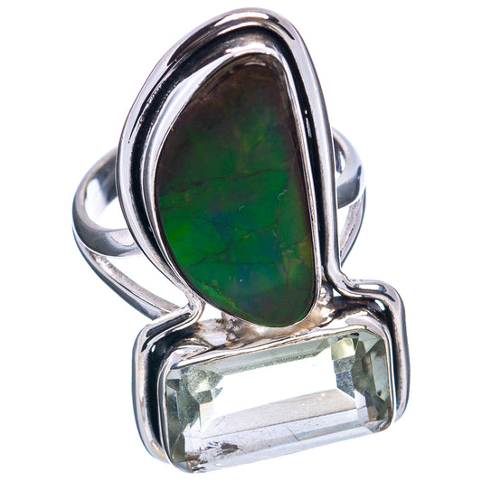 Sterling silver ring with green iridescent pear stone and clear rectangular bezel-set gem