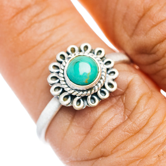 Turquoise oval gemstone sterling silver ring on finger, size 7.5, ornate scalloped bezel