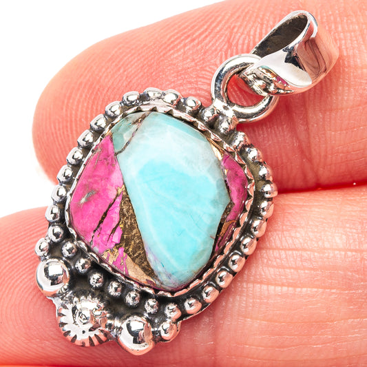 Sterling silver teardrop pendant with turquoise center stone and pink side inlays