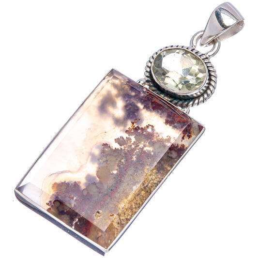 Sterling silver pendant featuring large rectangular plume agate with round green stone