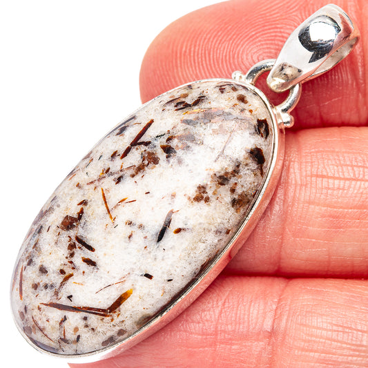 Oval astrophyllite pendant in .925 sterling silver bezel, speckled light stone cabochon