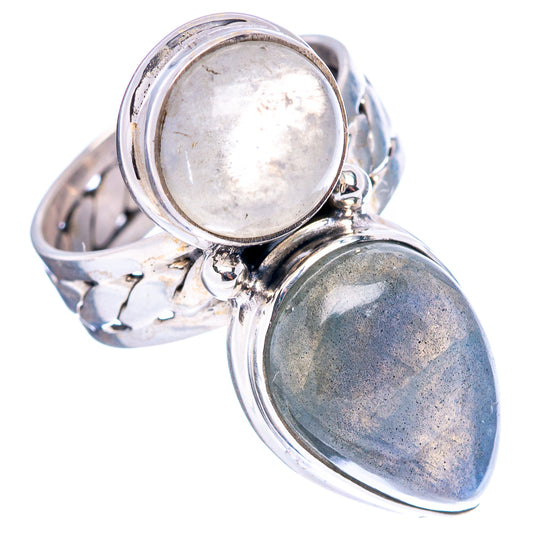 Sterling silver ring with round pale stone and oval dark blue gemstone, double cabochon