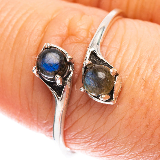 Sterling silver ring with oval labradorite gemstone and sculpted side prongs