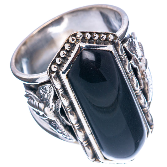 Oval black onyx sterling silver ring with scrollwork shoulders and bead-trim bezel