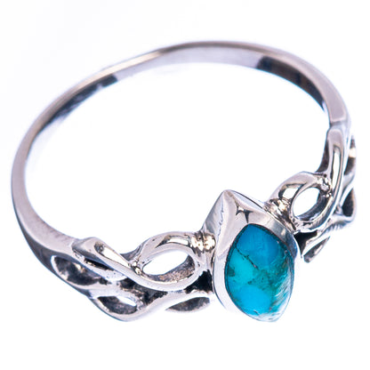 Sterling silver turquoise ring with oval bezel and decorative circular cutouts