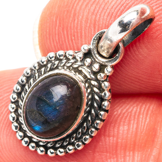 Sterling silver labradorite pendant with oval blue stone and beaded halo setting