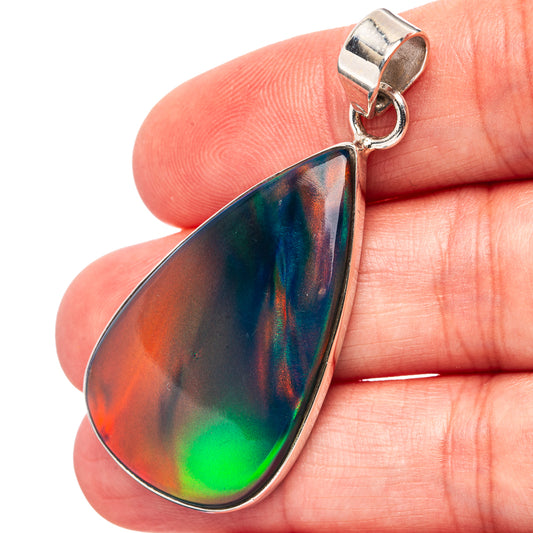 Sterling silver opal pendant with teardrop rainbow iridescent stone, bail detail