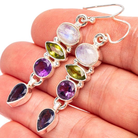 Sterling silver earrings with multicolor teardrop gemstones and scalloped bezel settings