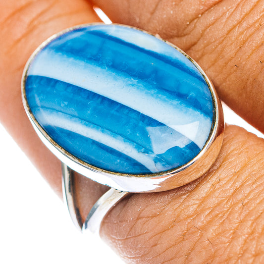 Oval blue opal cabochon ring with .925 sterling silver bezel setting