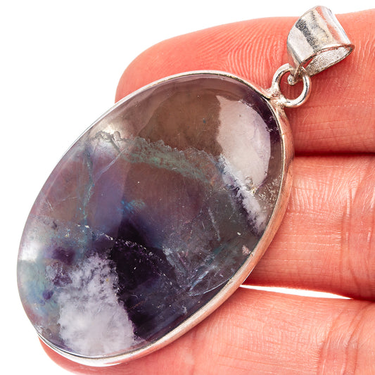 Fluorite pendant with oval silver-plated bezel, deep purple-blue and white mottled cabochon