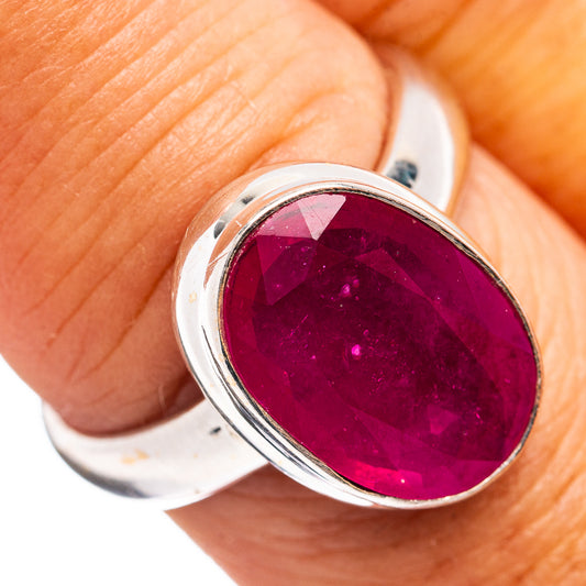 Oval ruby glass filled ring in .925 sterling silver, faceted pink-red center