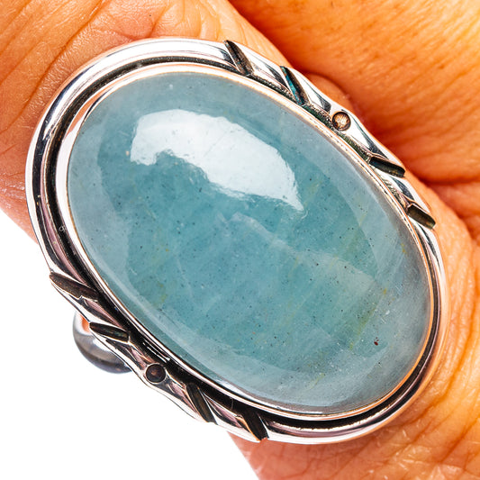 Oval aquamarine gemstone sterling silver ring, prong-set bezel, size 10.25.