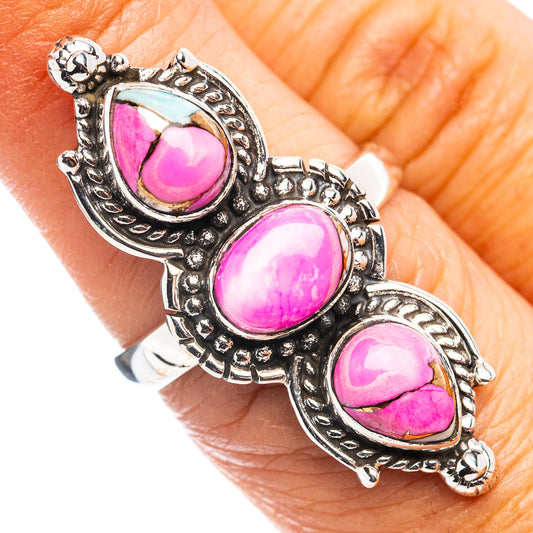 Sterling silver ring with three teardrop pink cabochon stones, ornate bezel setting