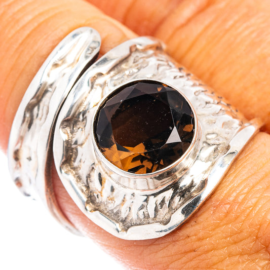 Adjustable sterling silver ring with dark smoky quartz oval bezel setting