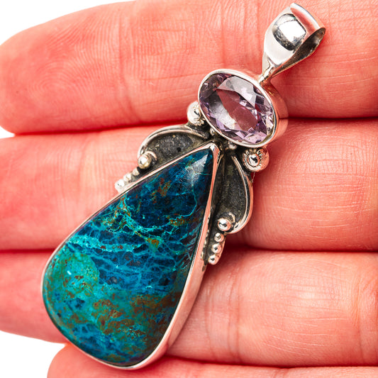 Sterling silver pendant with blue shattuckite teardrop and amethyst round top