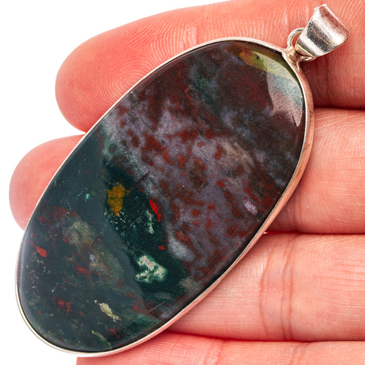 Silver-plated bloodstone pendant with oval dark green-red stone bezel