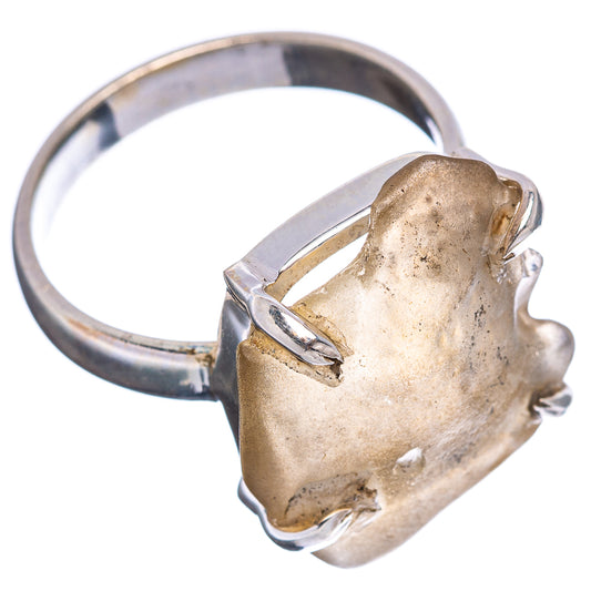 Side view of size 8.5 .925 sterling silver opal ring with bezel-set gemstone