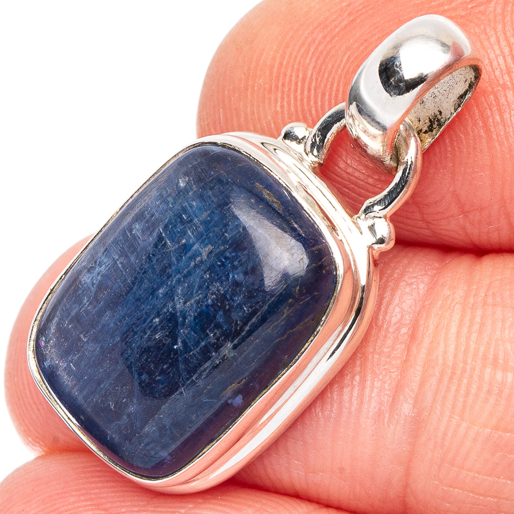 Sterling silver kyanite pendant with oval blue stone in a polished bezel setting