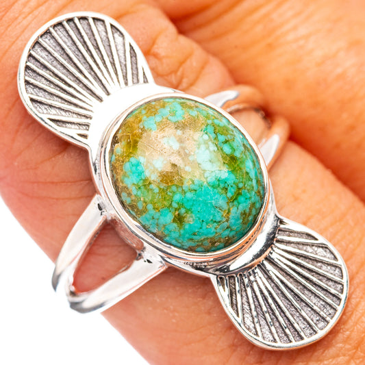 Sterling silver turquoise cabochon ring with oval teal stone and shell design, size 9