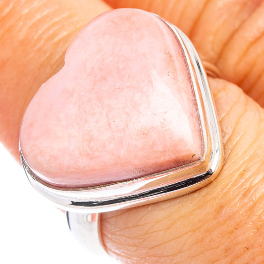 Pink opal heart ring in .925 sterling silver, close-up of pink heart stone