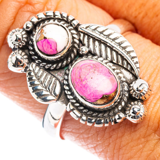 Sterling silver ring with two oval pink stones and ornate bezel detailing