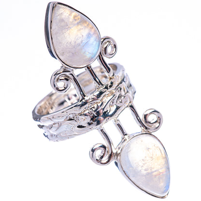 Sterling silver moonstone ring with two iridescent teardrop stones and ornate openwork
