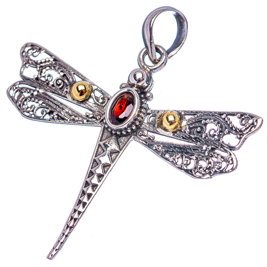 Sterling silver dragonfly pendant with oval red gem and small gold accents, loop bail