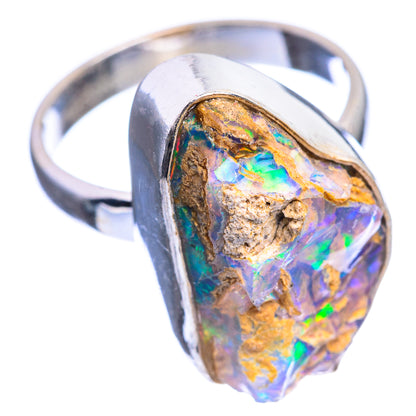 Sterling silver opal ring with bezel-set raw opal, angled view, size 7.5