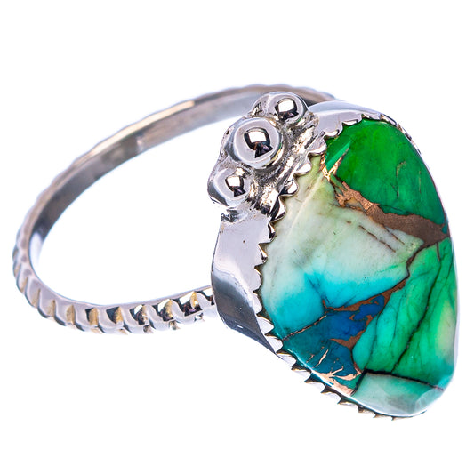 Sterling silver oval turquoise ring with scalloped band and raised bezel setting