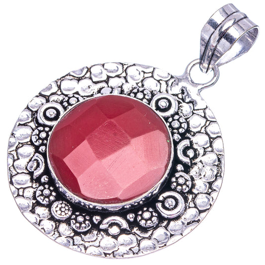 Red onyx round pendant with ornate German silver setting and top bail