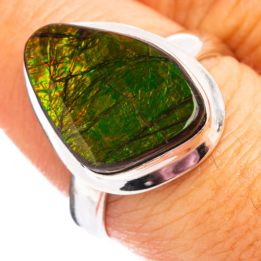 Sterling silver ring with green ammolite teardrop gemstone