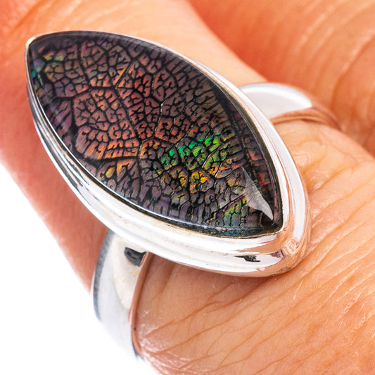 Sterling silver opal ring with oval iridescent cracked pattern face