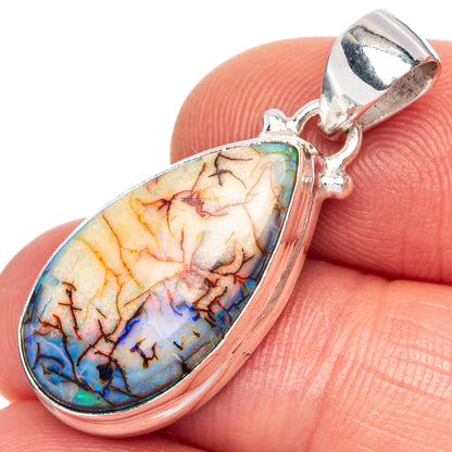 Sterling silver opal pendant with oval multicolor cabochon and polished loop bail