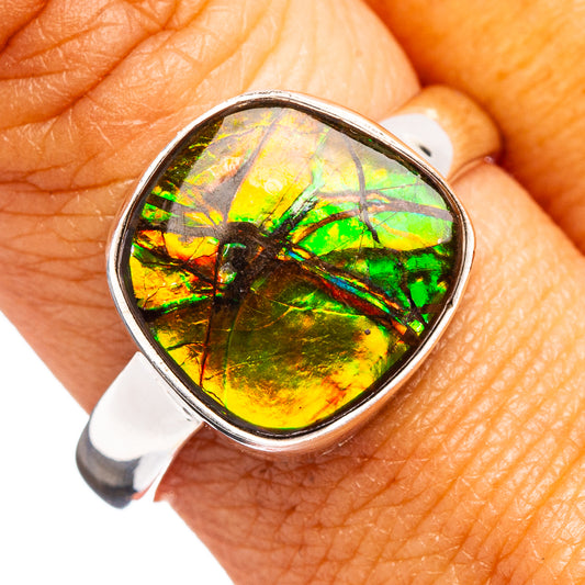 Oval ammolite cabochon ring in .925 sterling silver, green and gold iridescent stone