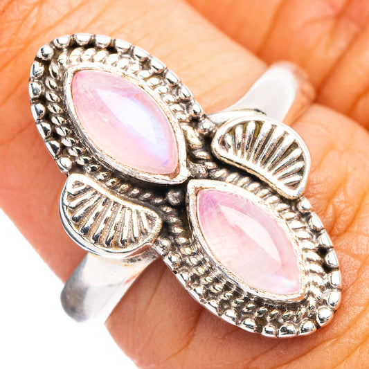 Pink moonstone ring with two oval stones and scalloped .925 sterling silver frame