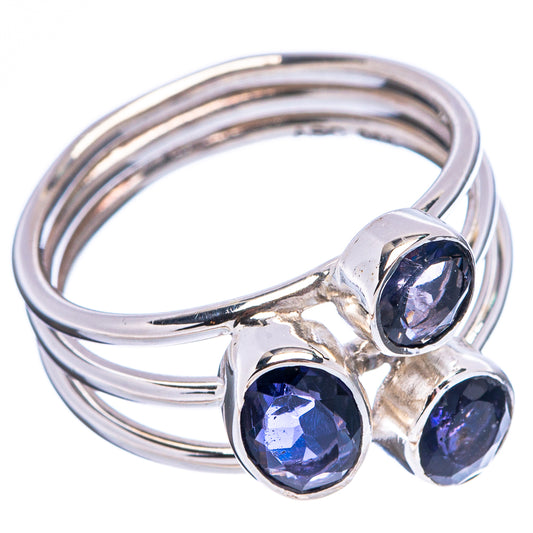Sterling silver ring with three round dark blue-purple stones in a crossover band