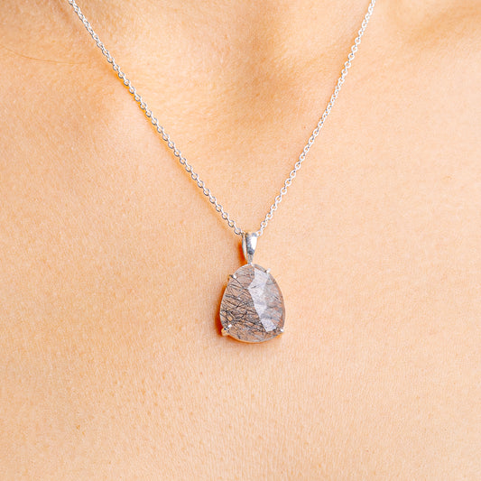 Tourmalinated quartz pendant necklace in .925 sterling silver with faceted gray stone